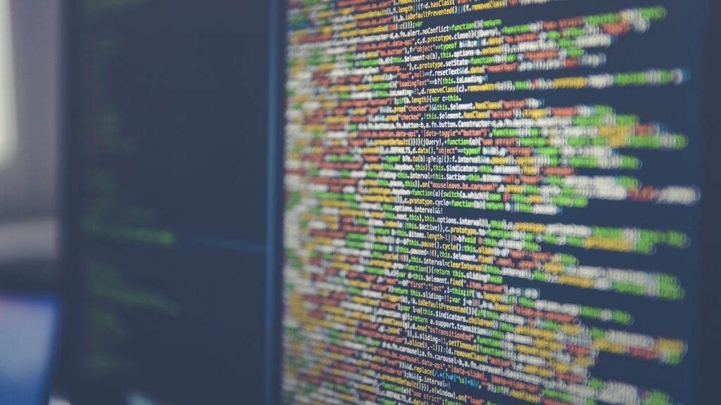 Code informatique sur écran, illustration des outils IA
